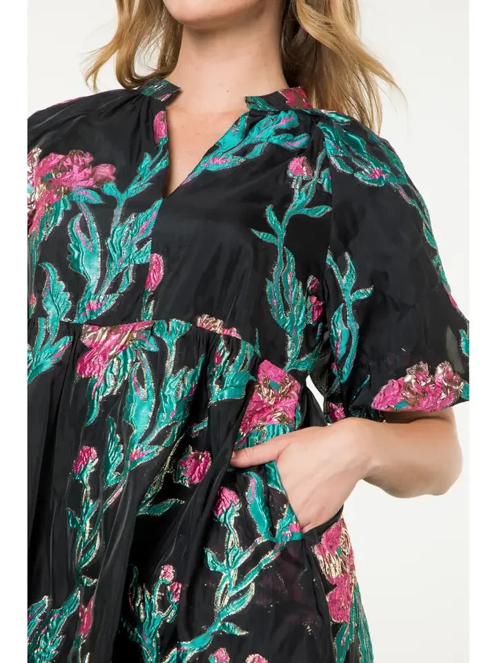 Tamara Dress featuring vibrant floral embroidery, perfect for coastal boutique clothing and tropical vacation dresses.