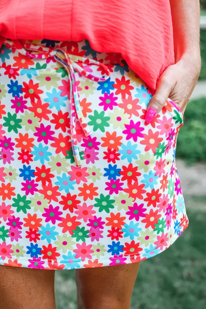 Bright Blooms Skort featuring vibrant floral patterns, perfect for summer outfits Texas at Raggdoll Boutique.