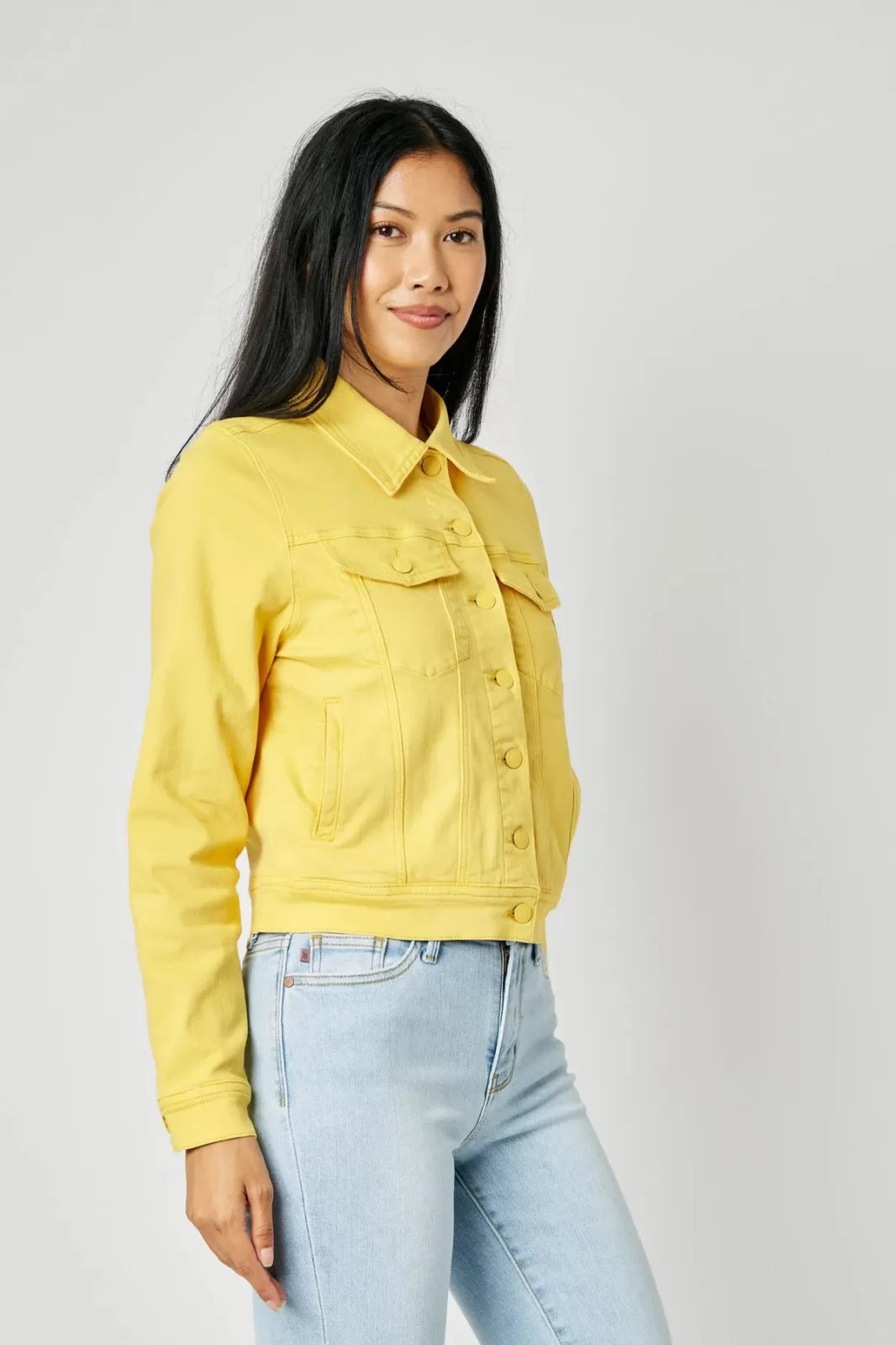 JUDY BLUE YELLOW DYED DENIM JACKET displayed on a model, styled for trendy coastal fashion from Raggdoll Boutique.