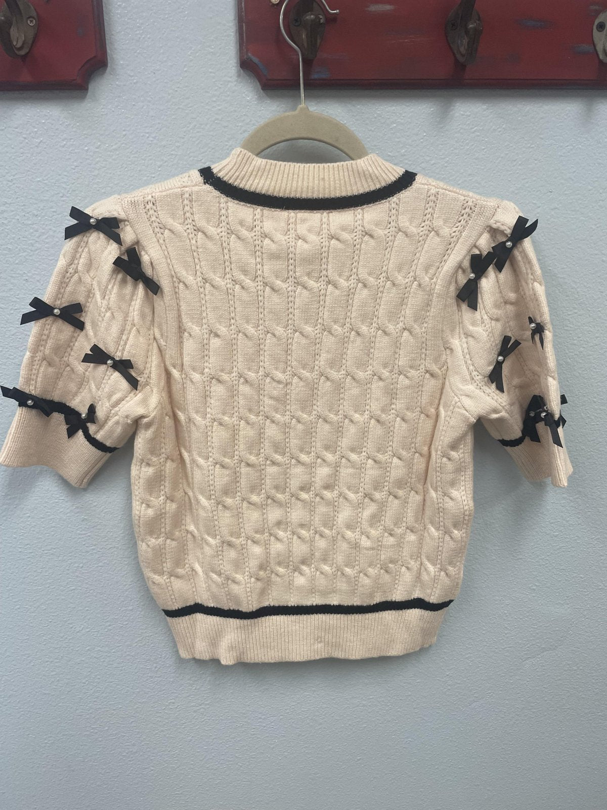 THML Cream Sweater with Bow Details, perfect for coastal boutique clothing and stylish women's fashion.