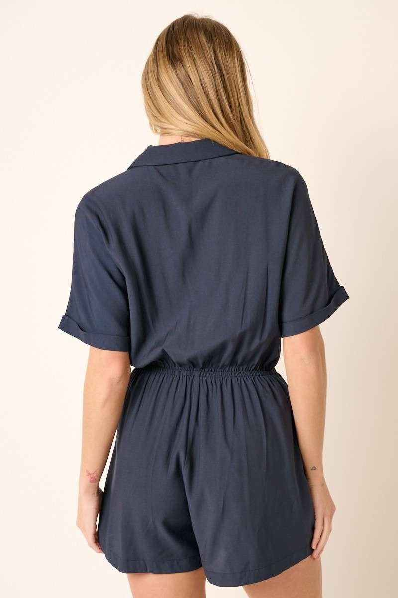 Back view of the Kate Romper from Raggdoll Boutique, featuring a notch collar and elastic waistband, perfect for summer outfits Texas.