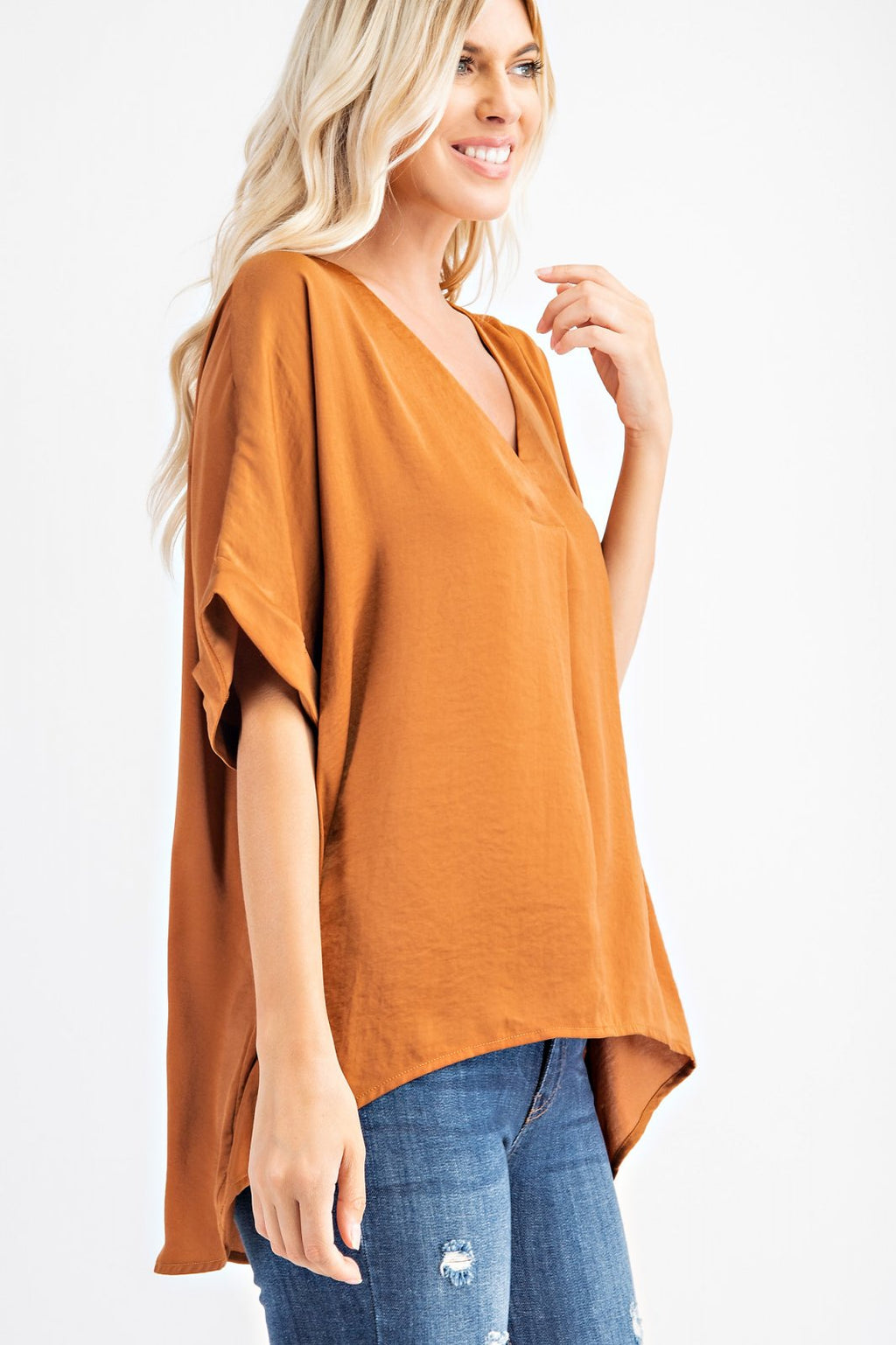 CAMEL HI-LOW TOP worn by model, high-low hem and V-neck from Raggdoll Boutique, perfect for summer outfits Texas.
