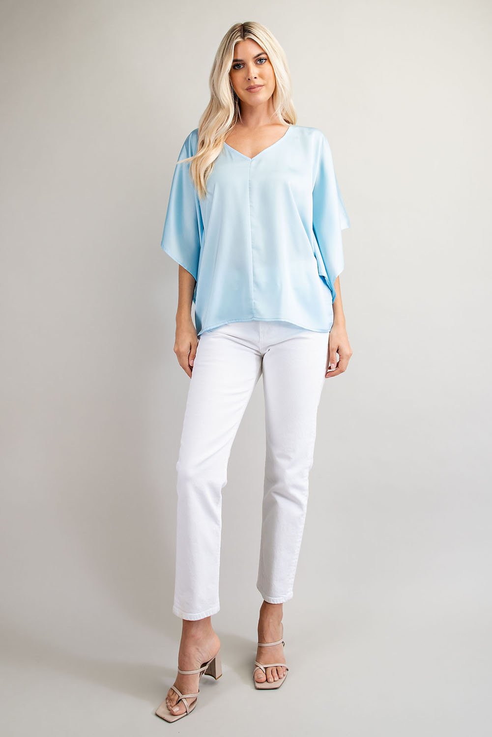 SKY BLUE V-NECK KIMONO TOP worn with white pants, perfect for trendy coastal style from Raggdoll Boutique.