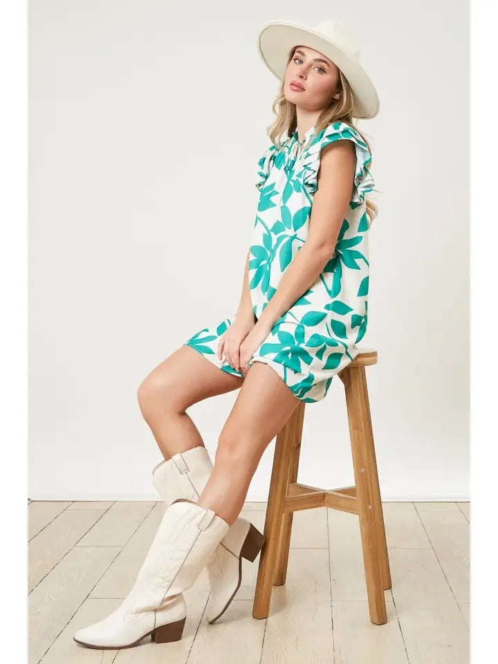 Model wearing the Anna Dress from Raggdoll Boutique, showcasing trendy coastal style perfect for summer outfits Texas.
