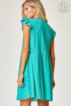 Fresh as Spring dress from Raggdoll Boutique, showcasing trendy coastal style in vibrant teal.