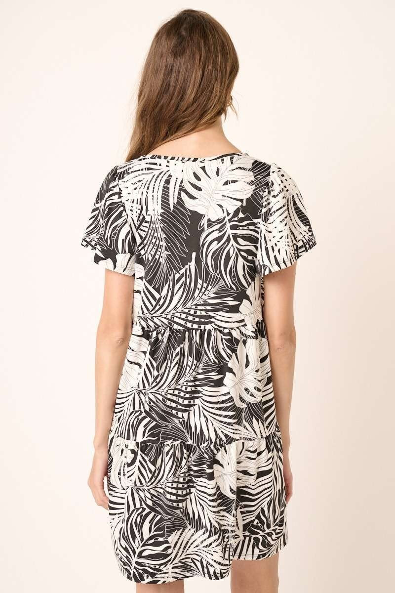 Miley Dress from Raggdoll Boutique, showcasing a tropical print ruffle tier mini dress, perfect for summer outfits Texas.