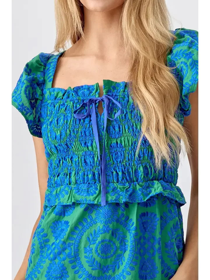 My New Favorite Dress from Raggdoll Boutique, showcasing trendy coastal style with vibrant colors.