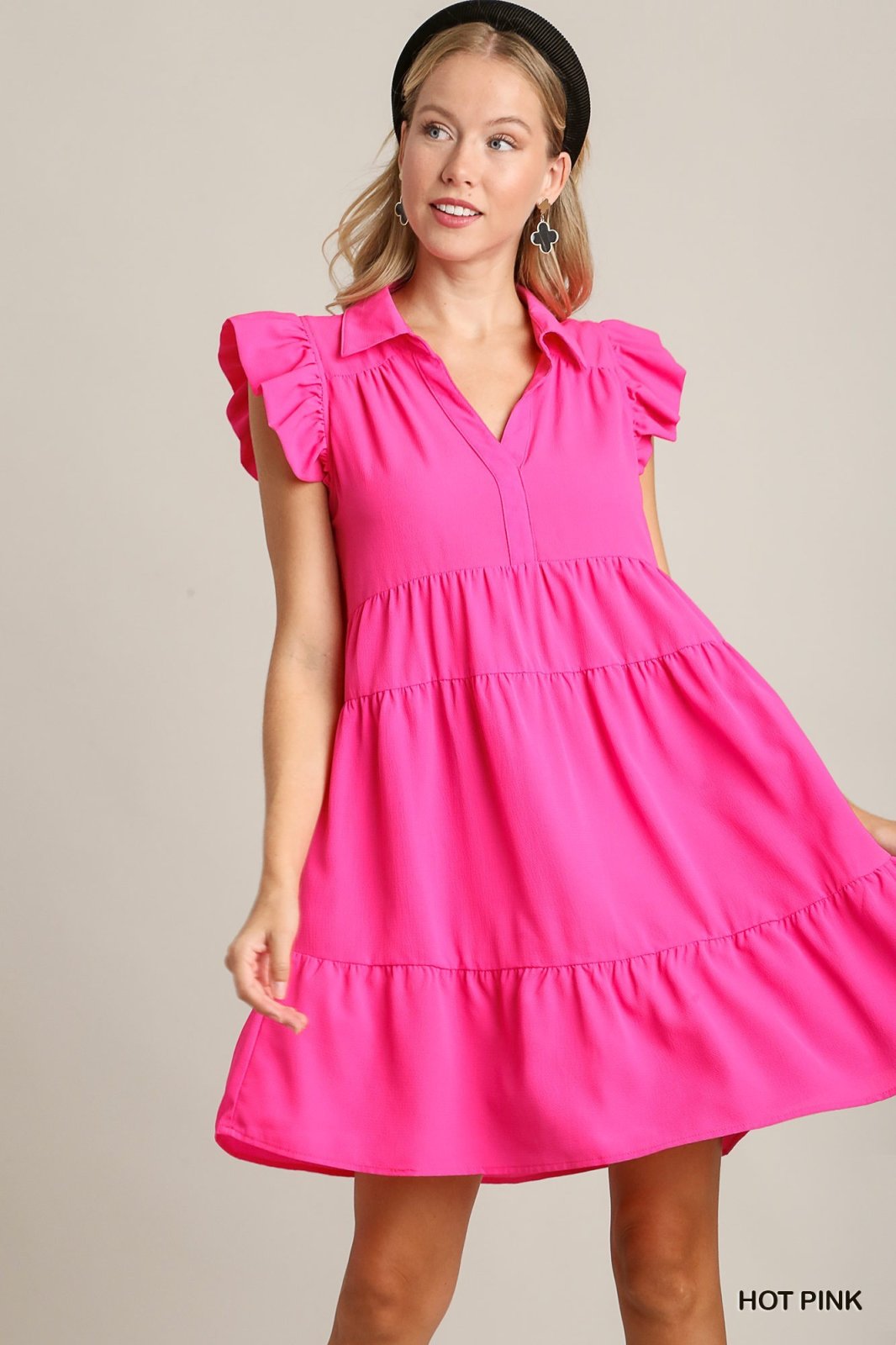 Hot pink ruffle sleeve tiered dress perfect for summer outings, from a coastal boutique specializing in women's fashion.