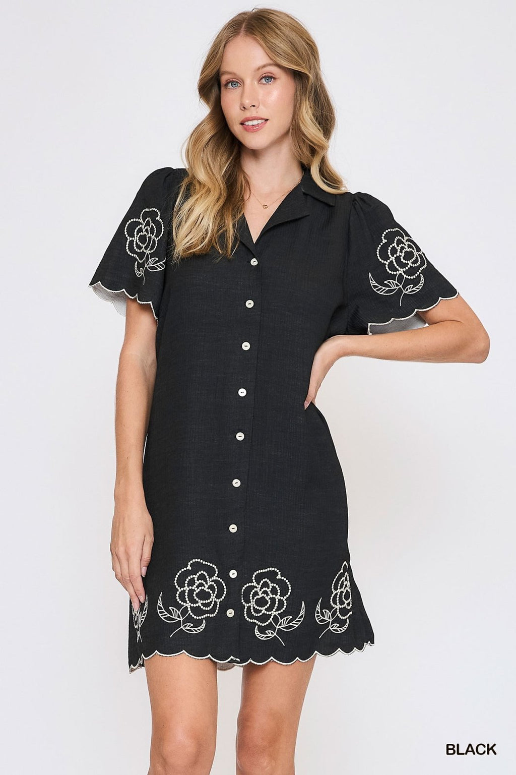 Black Tallah Dress with floral embroidery, perfect for coastal boutique clothing and tropical vacation outfits.