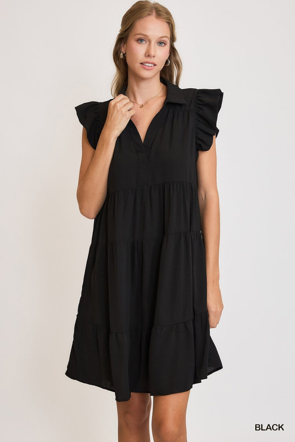 Chic Black Ruffle Sleeve Tiered Dress from coastal boutique clothing, perfect for tropical vacations and curvy plus size fashion.