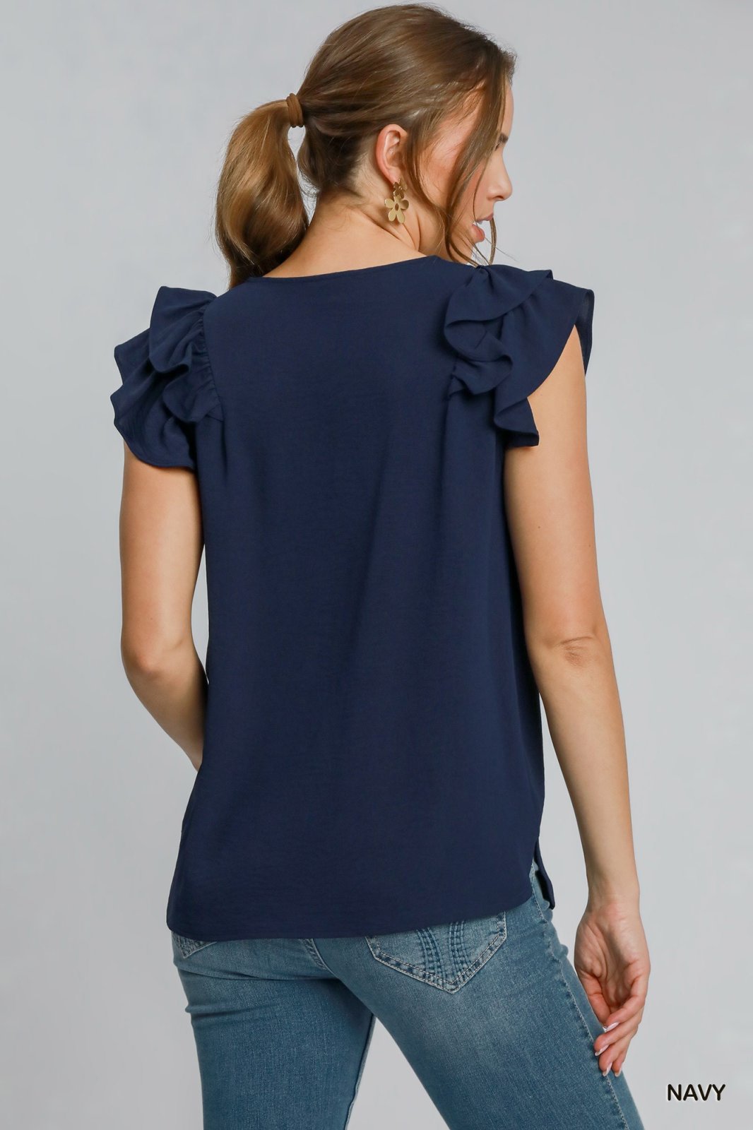 Indigo Rae Top in navy, a double layered flutter sleeve top perfect for coastal boutique clothing and summer beach dresses.