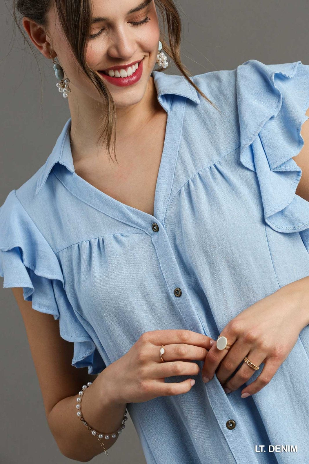 Light Denim Blues Dress styled with trendy accessories at Raggdoll Boutique, a Port Aransas coastal fashion boutique.