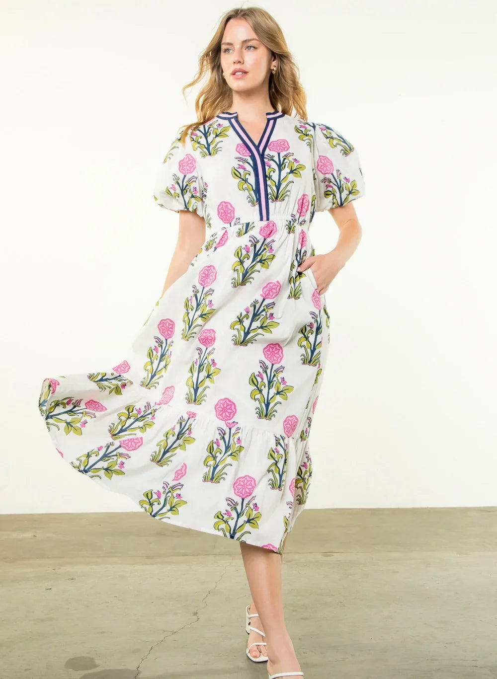 Florence Dress: Puff sleeve flower print midi-dress from a Port Aransas boutique, perfect for spring weddings and beach outings.