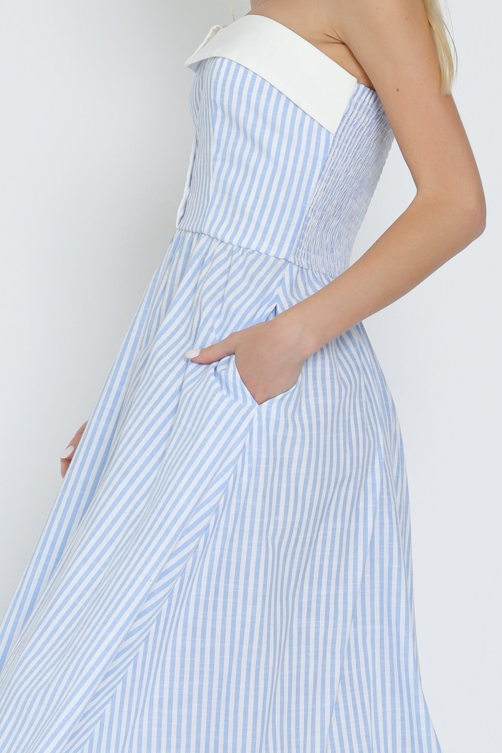 Light blue and white tube button-down midi dress with pockets, perfect for coastal boutiques and tropical vacations.