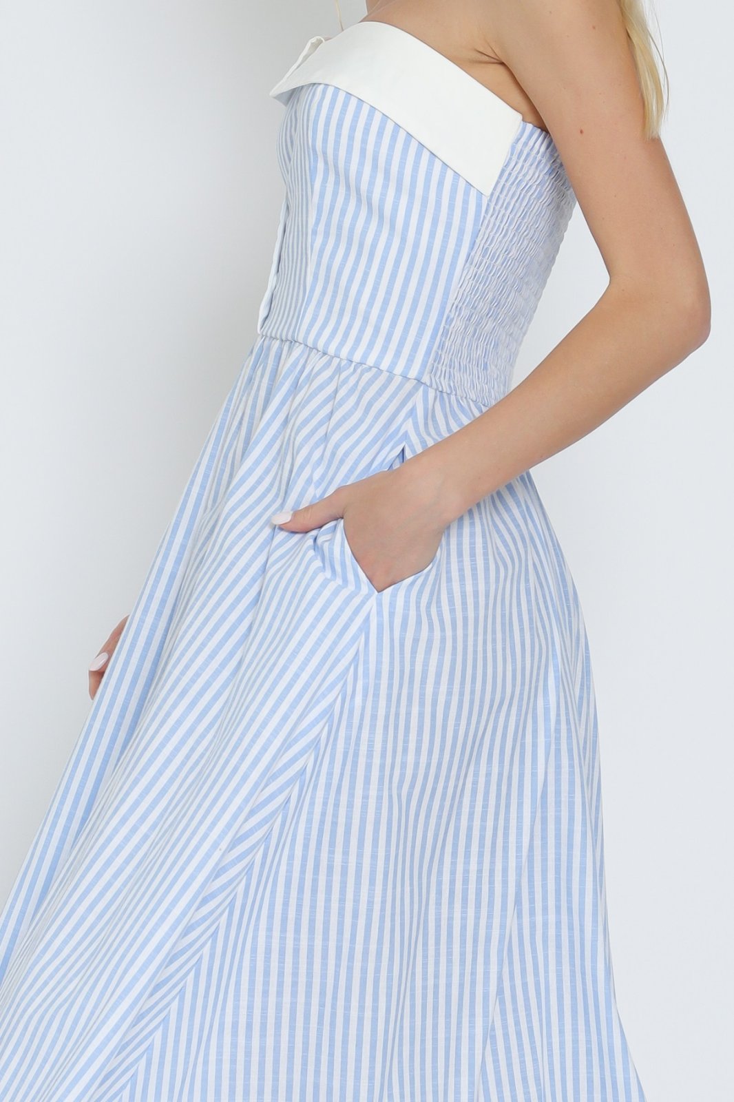Light blue and white tube button-down midi dress with pockets, perfect for coastal boutiques and tropical vacations.