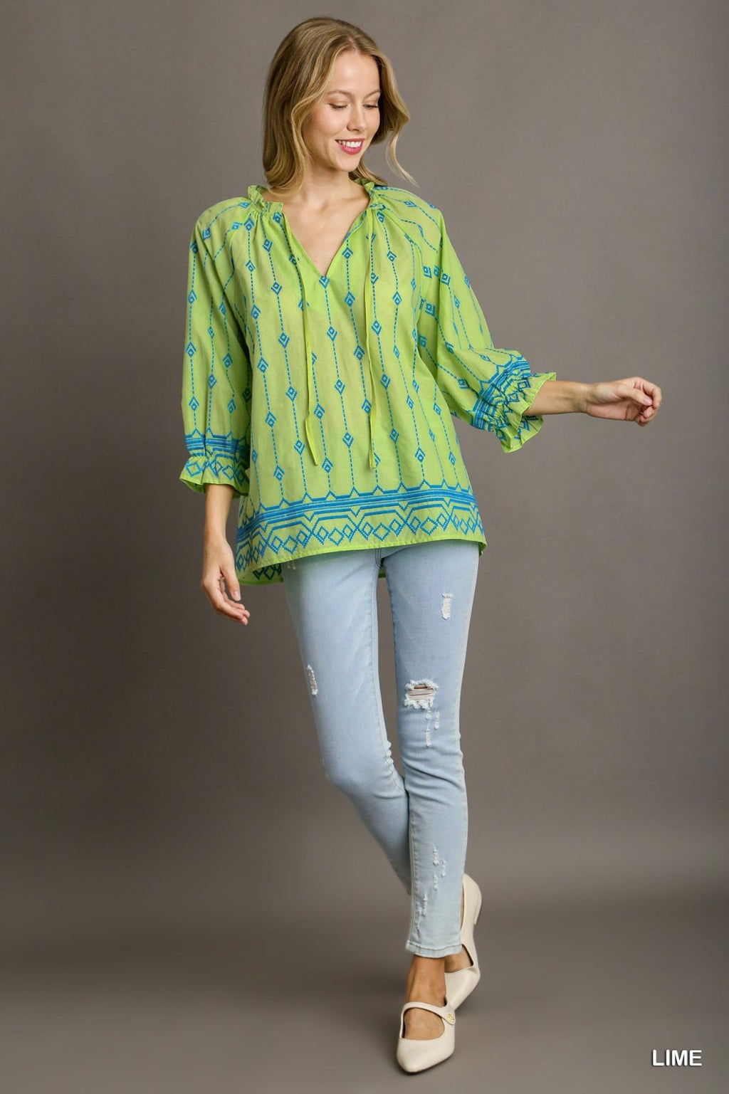 Lime and Blue Embroidered Top from Raggdoll Boutique, trendy coastal style for summer outfits in Port Aransas.