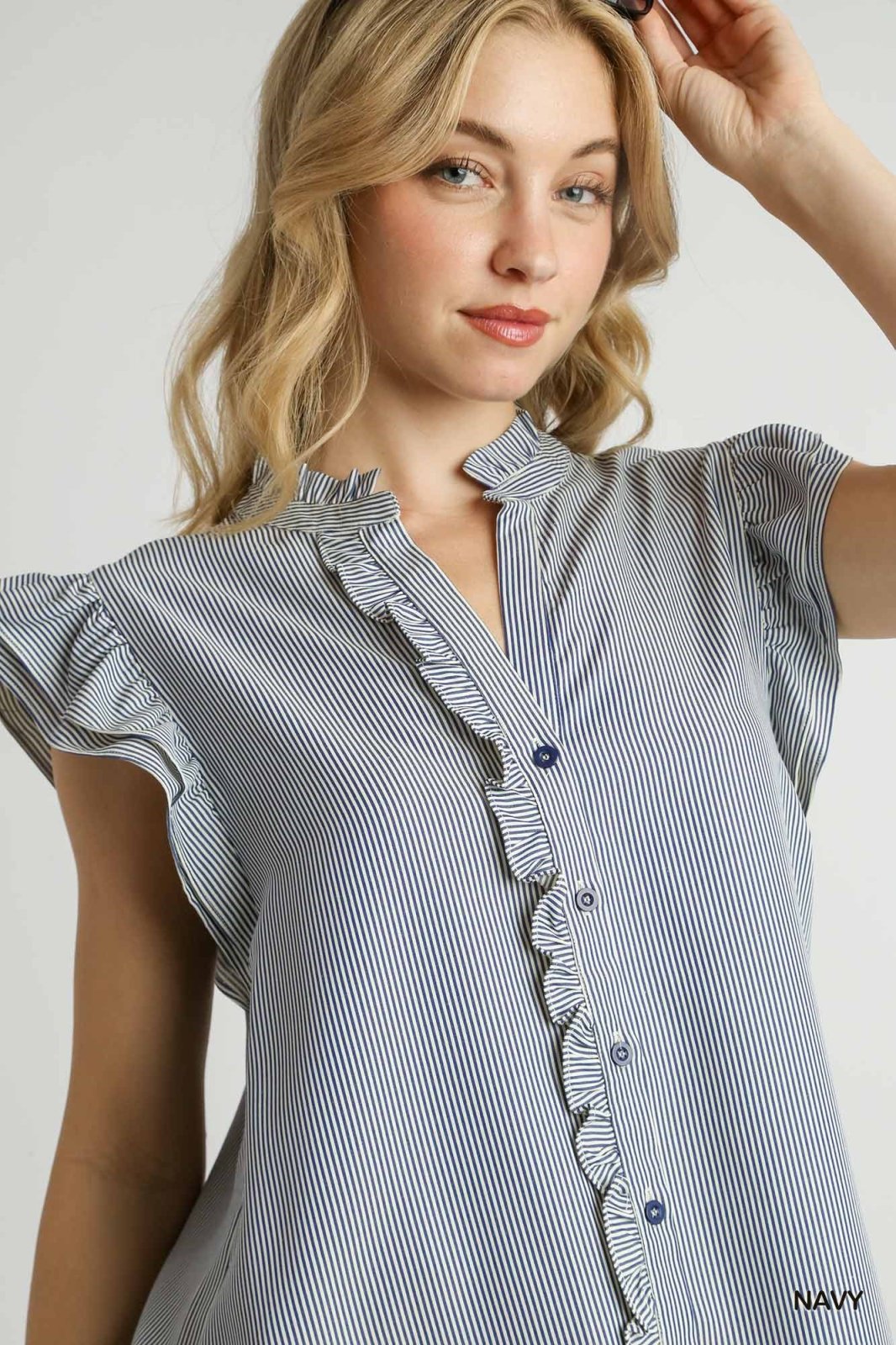 Navy and White Stripe Top from Raggdoll Boutique, a trendy coastal style perfect for summer outfits in Texas.