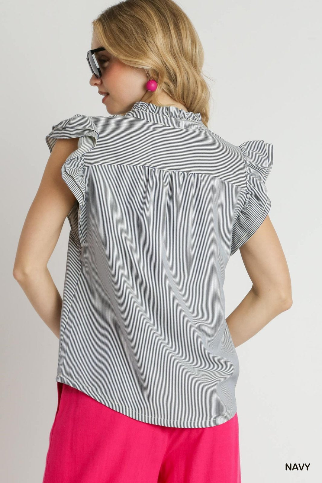 Navy and White Stripe Top featuring ruffled sleeves, perfect for trendy coastal style. Available at Raggdoll Boutique.