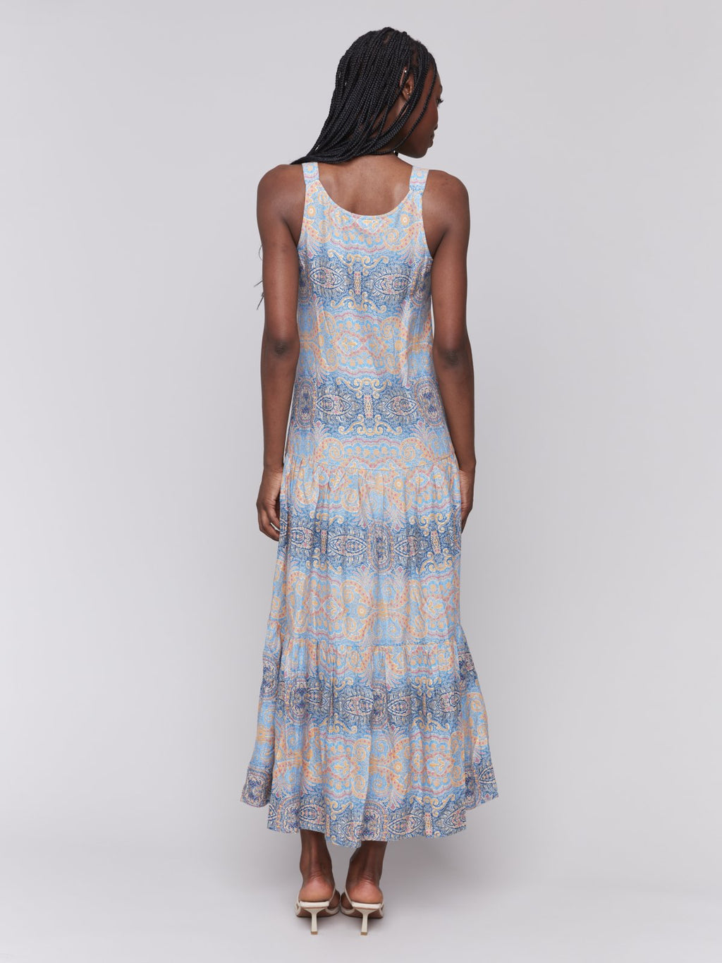 Back view of a stylish Papaya maxi dress, ideal for coastal boutique clothing and tropical vacations, from Port Aransas boutique.
