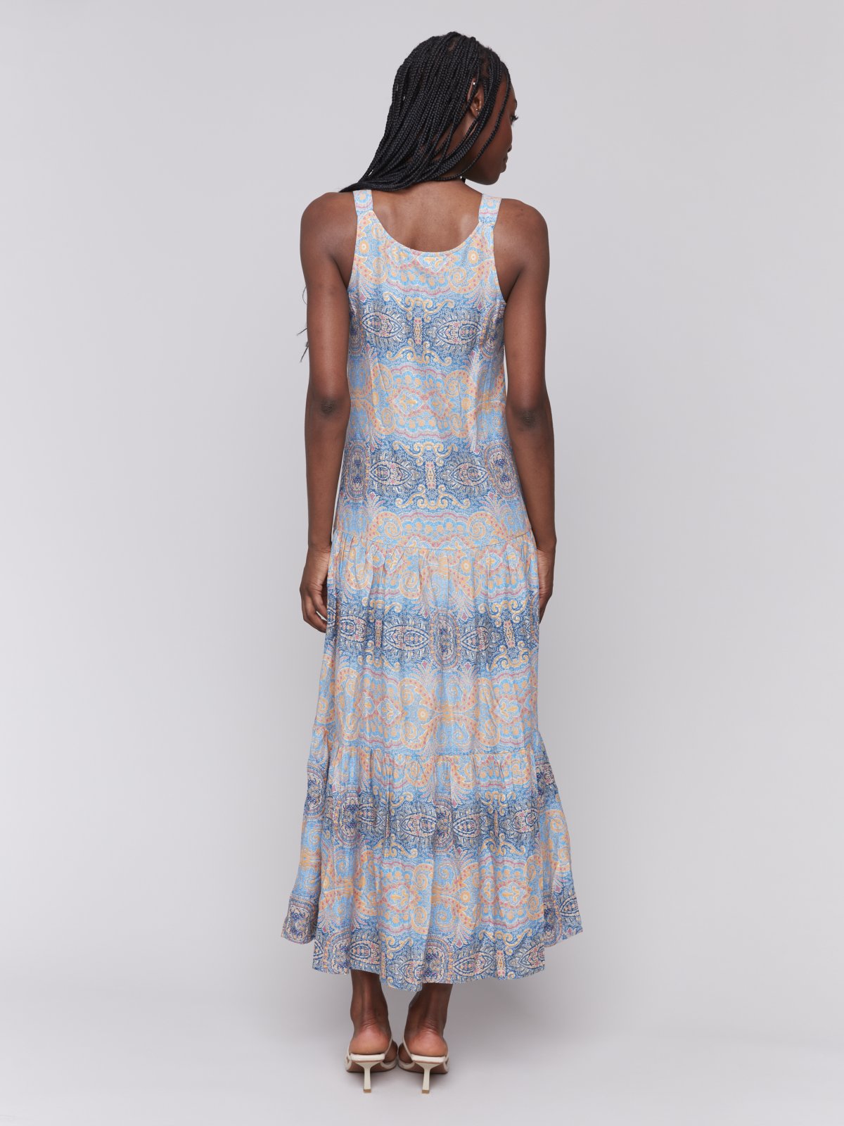 Back view of a stylish Papaya maxi dress, ideal for coastal boutique clothing and tropical vacations, from Port Aransas boutique.