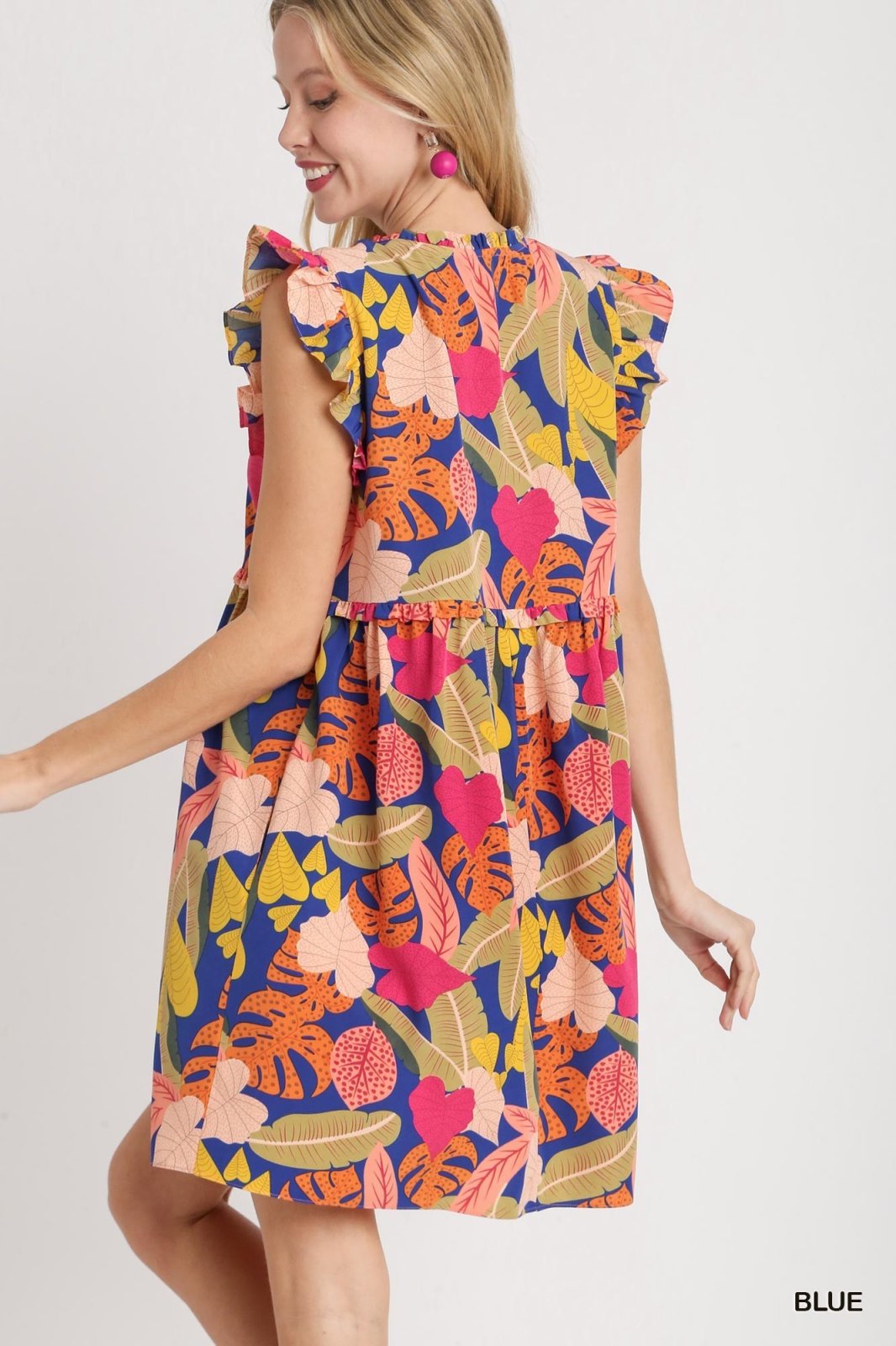 Sweet Wishes Dress in vibrant floral design, perfect for coastal boutique clothing and tropical vacations.