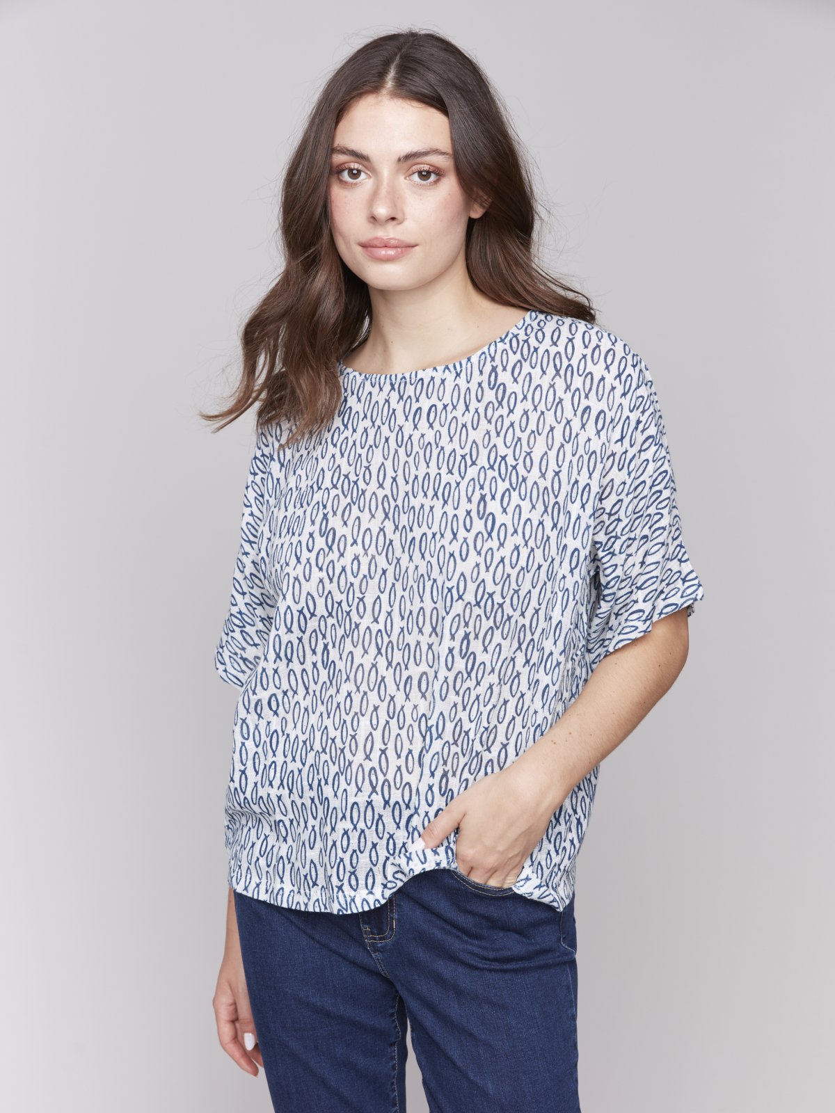 Fishy, Fishy Top from a coastal boutique, a stylish and flowing summer blouse perfect for tropical vacations.