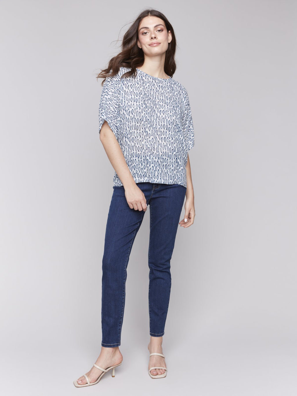 Fun dolman top in blue print, perfect for summer days. Curated women's fashion from a coastal boutique.