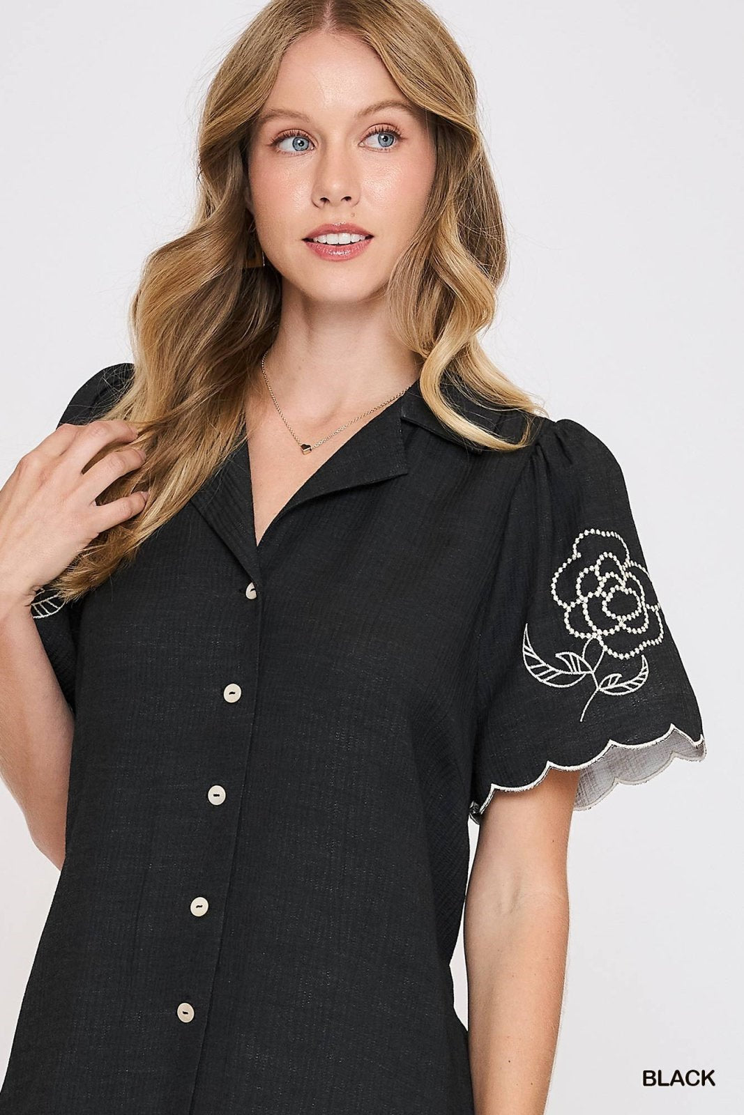 Tallah Dress from coastal boutique clothing, featuring embroidered sleeves, perfect for tropical vacations and chic outings.