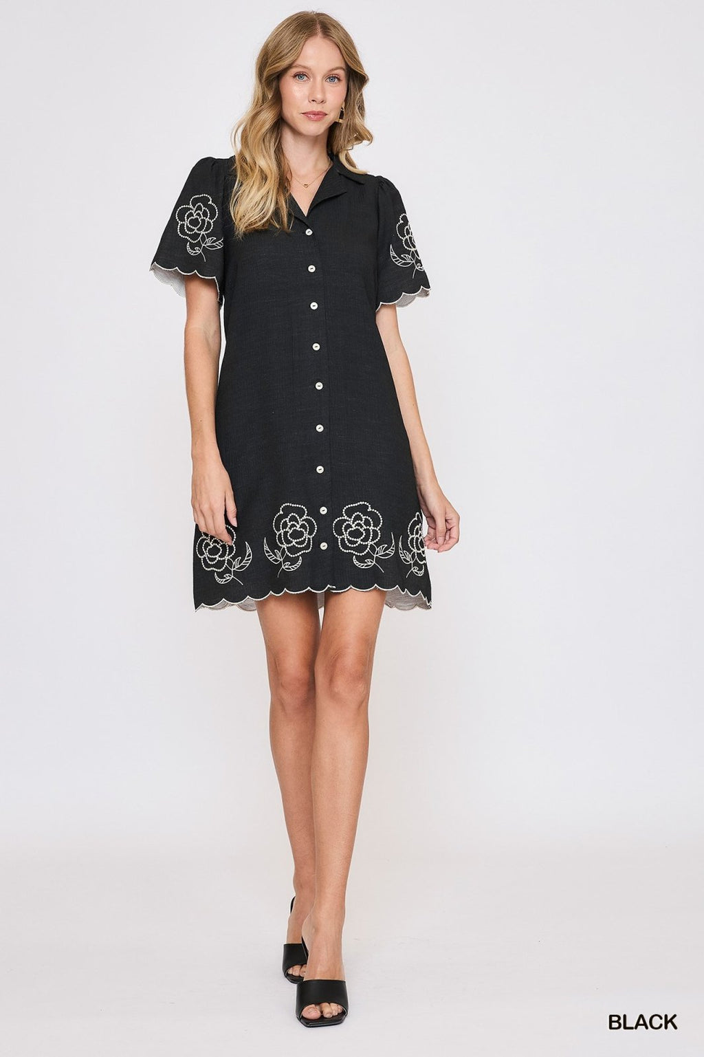 Stylish Tallah Dress in black with floral design, perfect for beach outings. Available at Port Aransas boutique.