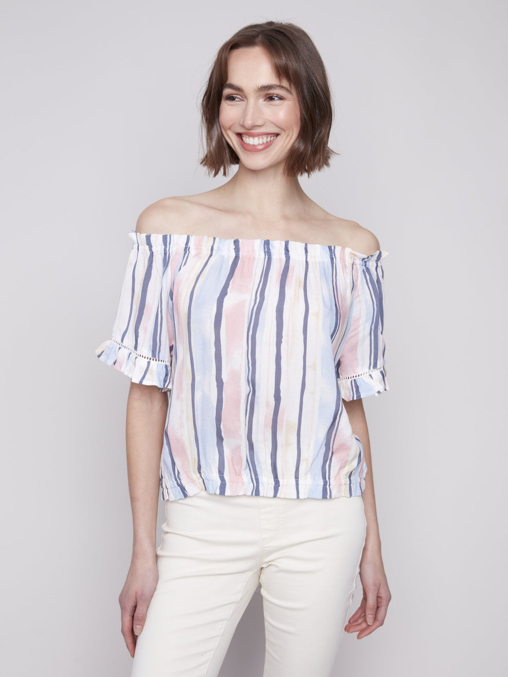 Stylish pink and blue striped top perfect for summer, ideal for coastal boutique clothing and beach dresses.