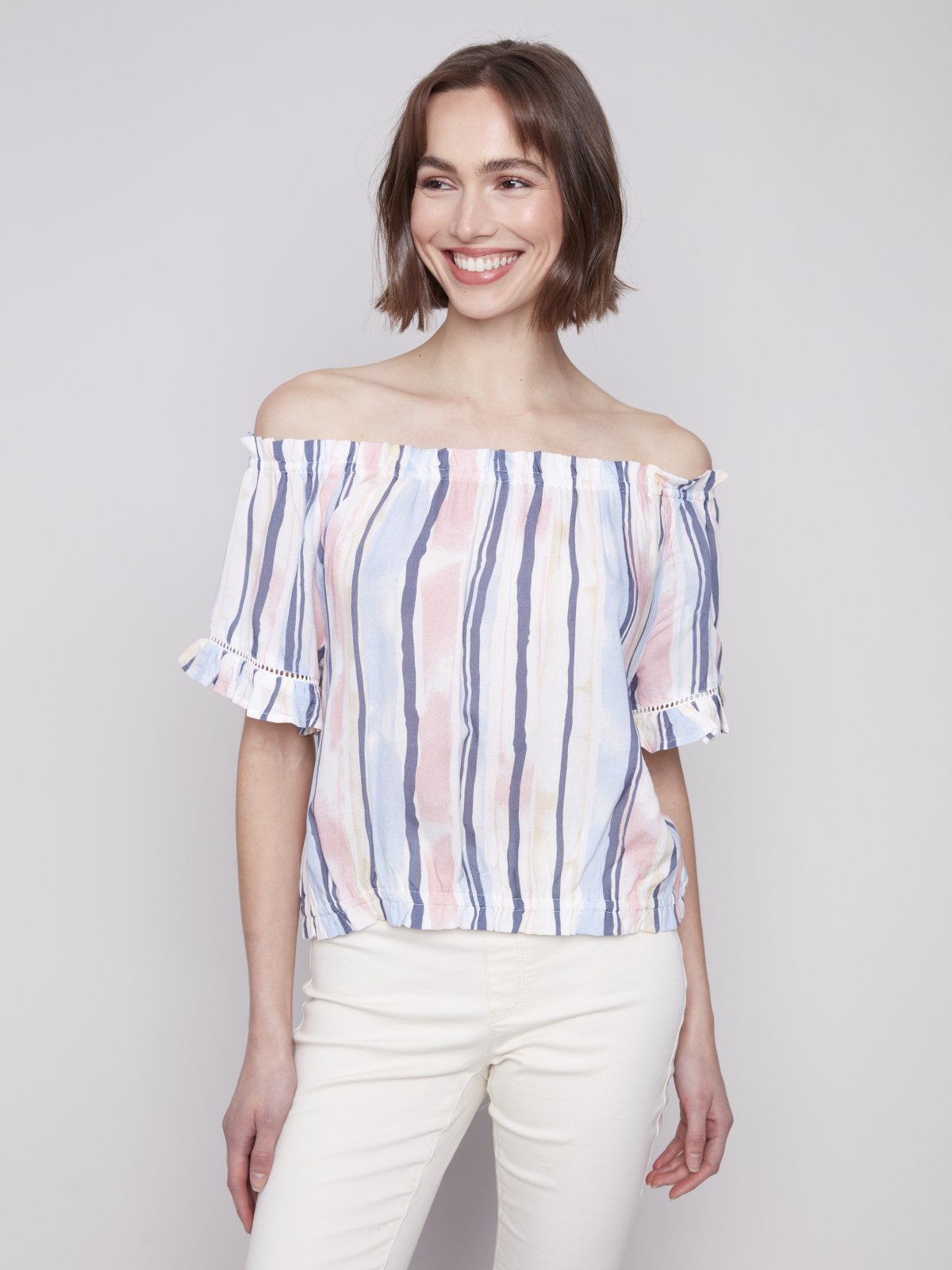 Stylish pink and blue striped top perfect for summer, ideal for coastal boutique clothing and beach dresses.