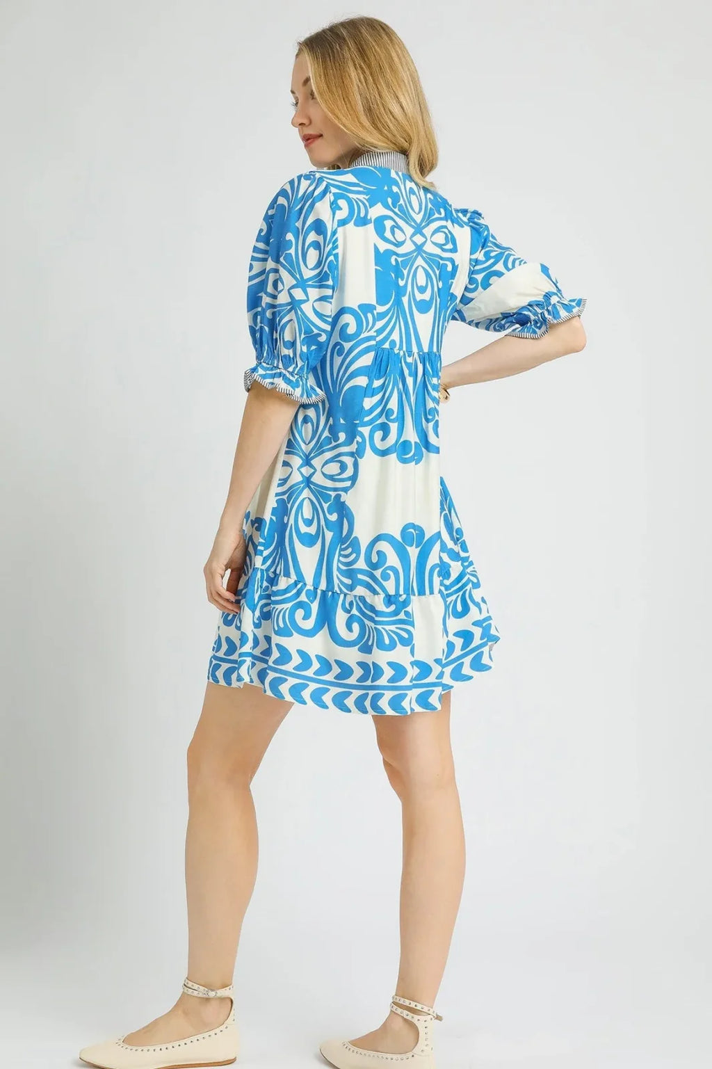 Isabella Dress: chic two-tone print tiered mini dress, perfect for coastal boutique clothing and tropical vacation wear.