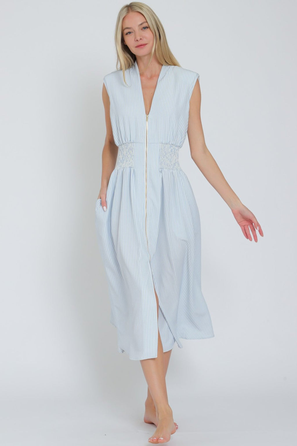 Catherine Dress in light blue with white stripes, perfect for spring from a coastal boutique clothing collection.