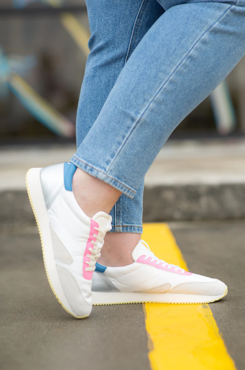 FARRAH PINK/WHITE TENNIS SHOE worn with denim, perfect for trendy coastal style from Raggdoll Boutique.