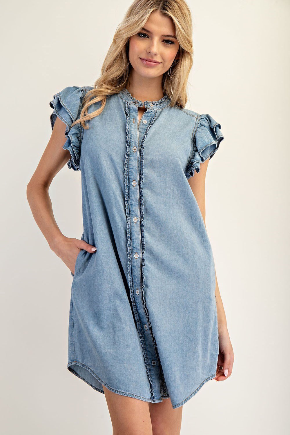 Kelly Dress featuring layered ruffle sleeves and frayed edge button front, perfect for coastal boutique clothing and beach outings.