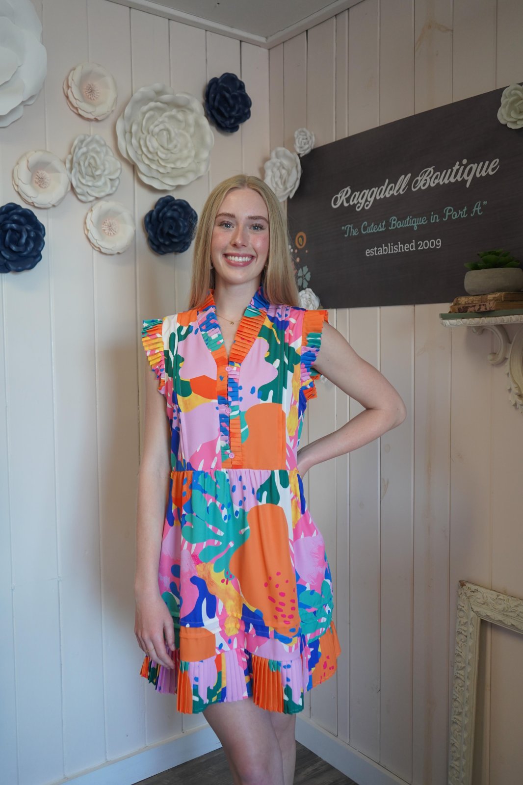 Brynlee Dress: Colorful mini dress from a coastal boutique, perfect for casual wear and tropical vacations.