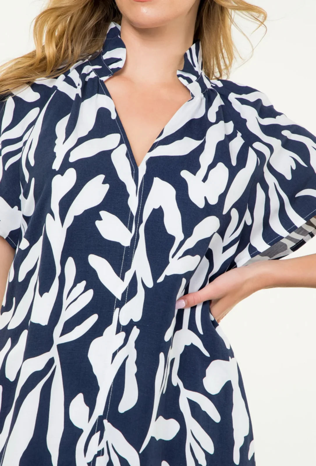 Navy short sleeve Lorna Dress with bold white print, perfect for casual outings and beach wear from a coastal boutique.