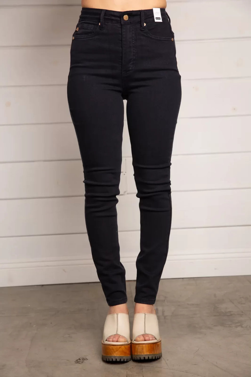 JUDY BLUE HW TUMMY CONTROL SKINNY-NAVY paired with trendy shoes, a stylish choice from Raggdoll Boutique.