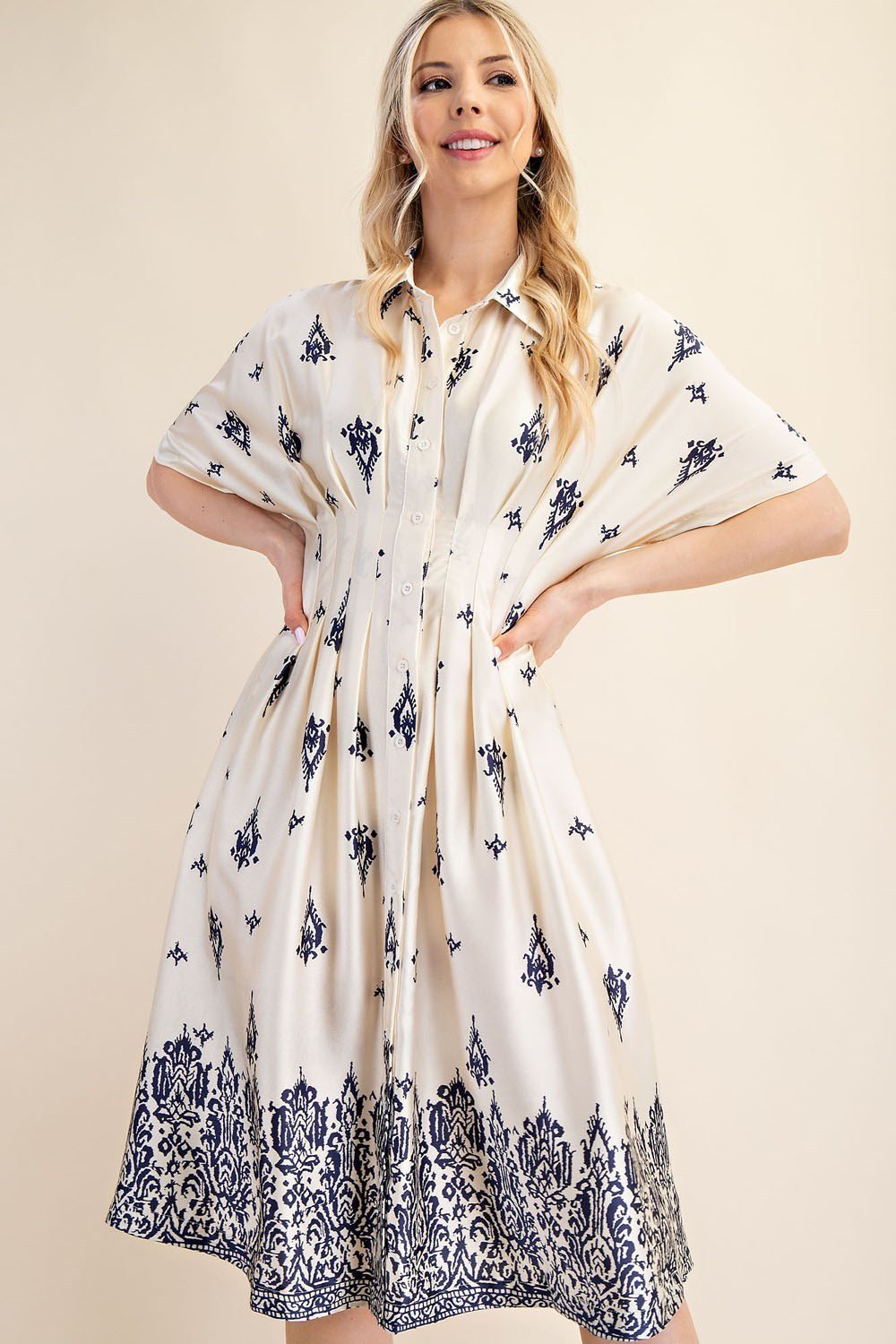 Navy and white Liza Dress, perfect for coastal boutique clothing, brunch dates, and tropical vacations. A stylish choice for women.