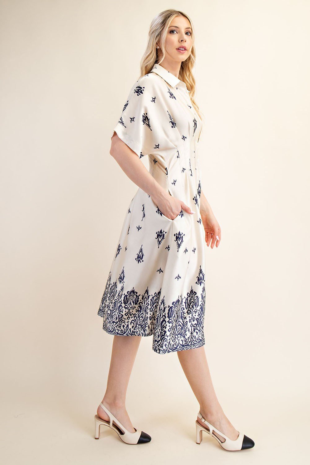 Liza Dress in navy and cream, perfect for a coastal boutique clothing look, ideal for brunch or casual work meetings.