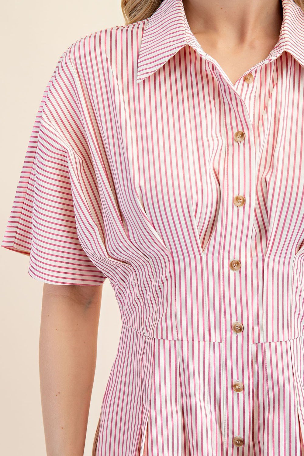 Close-up of the pink striped Ember Romper, featuring a collar and soft pleated detailing, ideal for coastal boutique clothing.