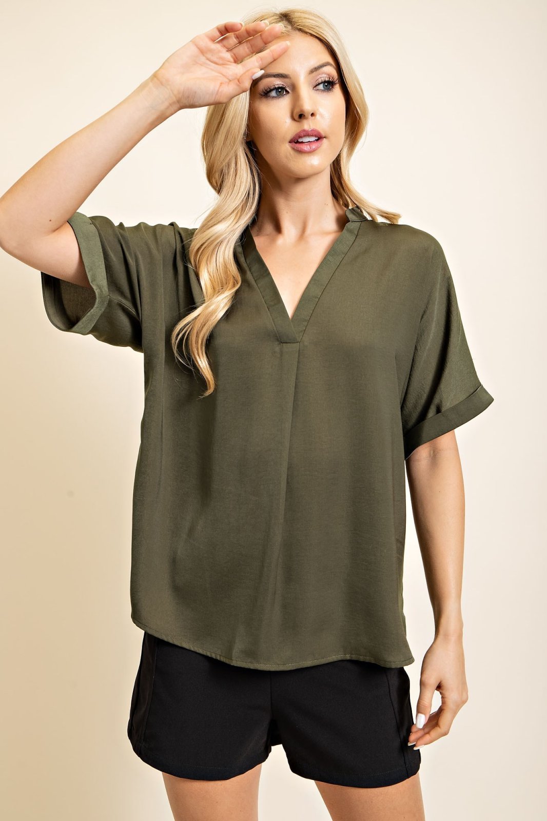 OLIVE SATIN HI-LO TOP styled with trendy shorts from Raggdoll Boutique, perfect for summer outfits Texas.