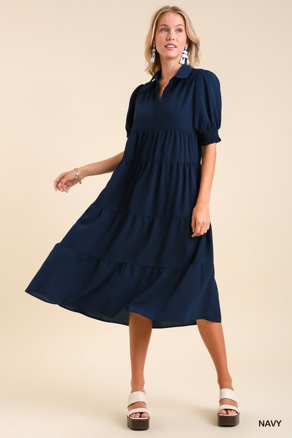 Model wearing NAVY TIERED MIDI dress from Raggdoll Boutique, perfect for trendy coastal style and summer outfits Texas.