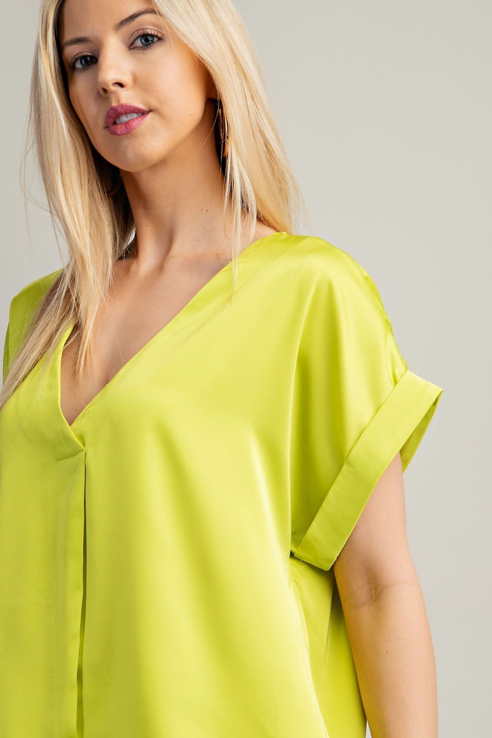 Lime V-Neck Short Sleeve Top for women, stylish addition to coastal boutique clothing, perfect for tropical vacation outfits.