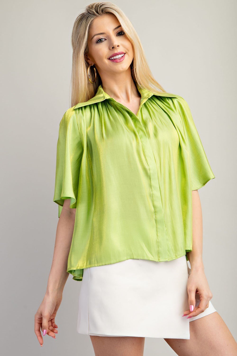Model wearing Lime Sparkle Button-up Flowy Top from Raggdoll Boutique for trendy coastal style.