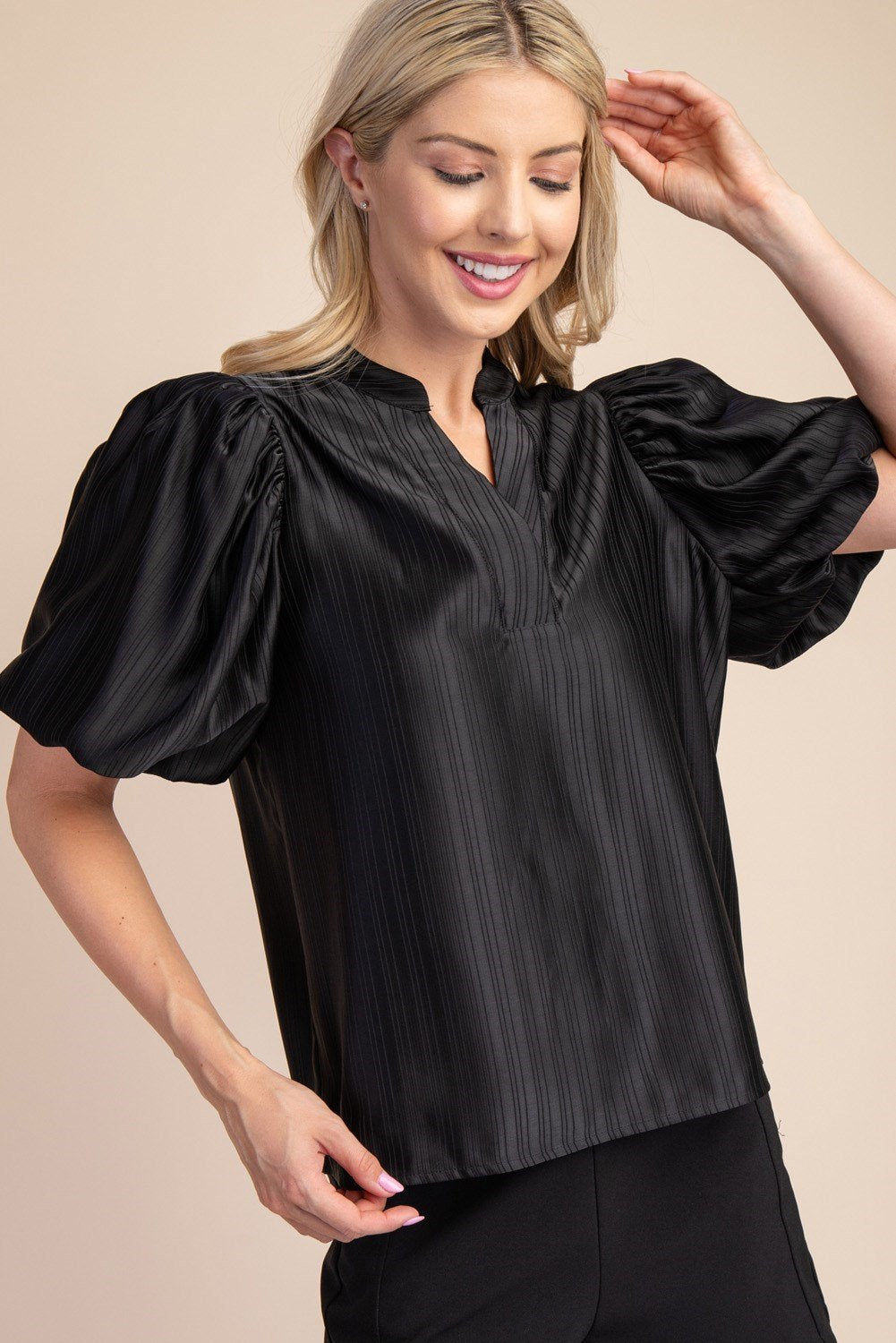Stylish black textured satin top, perfect for tropical vacation dresses and curated women's fashion from our Port Aransas boutique.