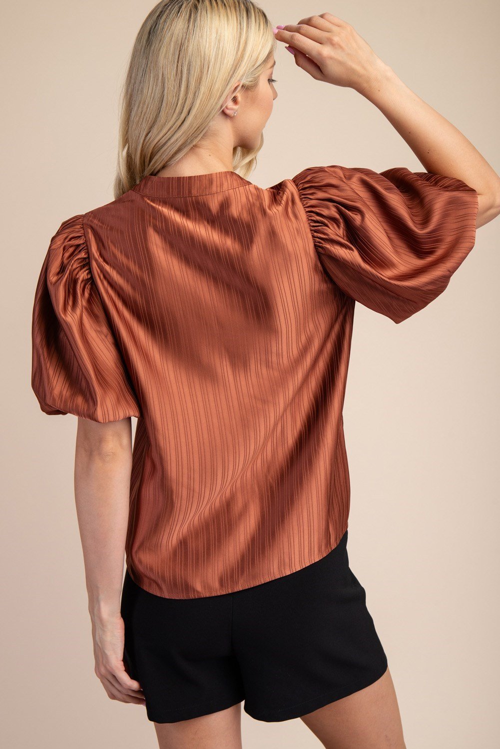 Terracotta V-neck textured top for women, perfect for coastal boutique clothing and tropical vacation dresses.
