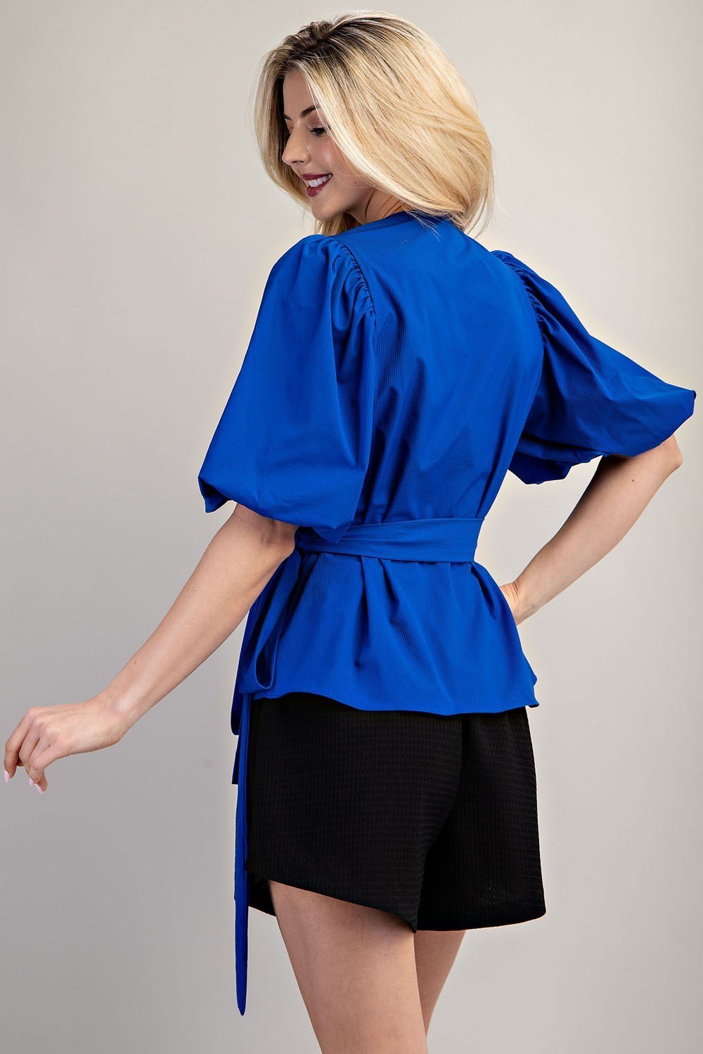 Stylish Marlin Blue Wrap blouse perfect for coastal boutique clothing and curvy plus size fashion at a Port Aransas boutique.