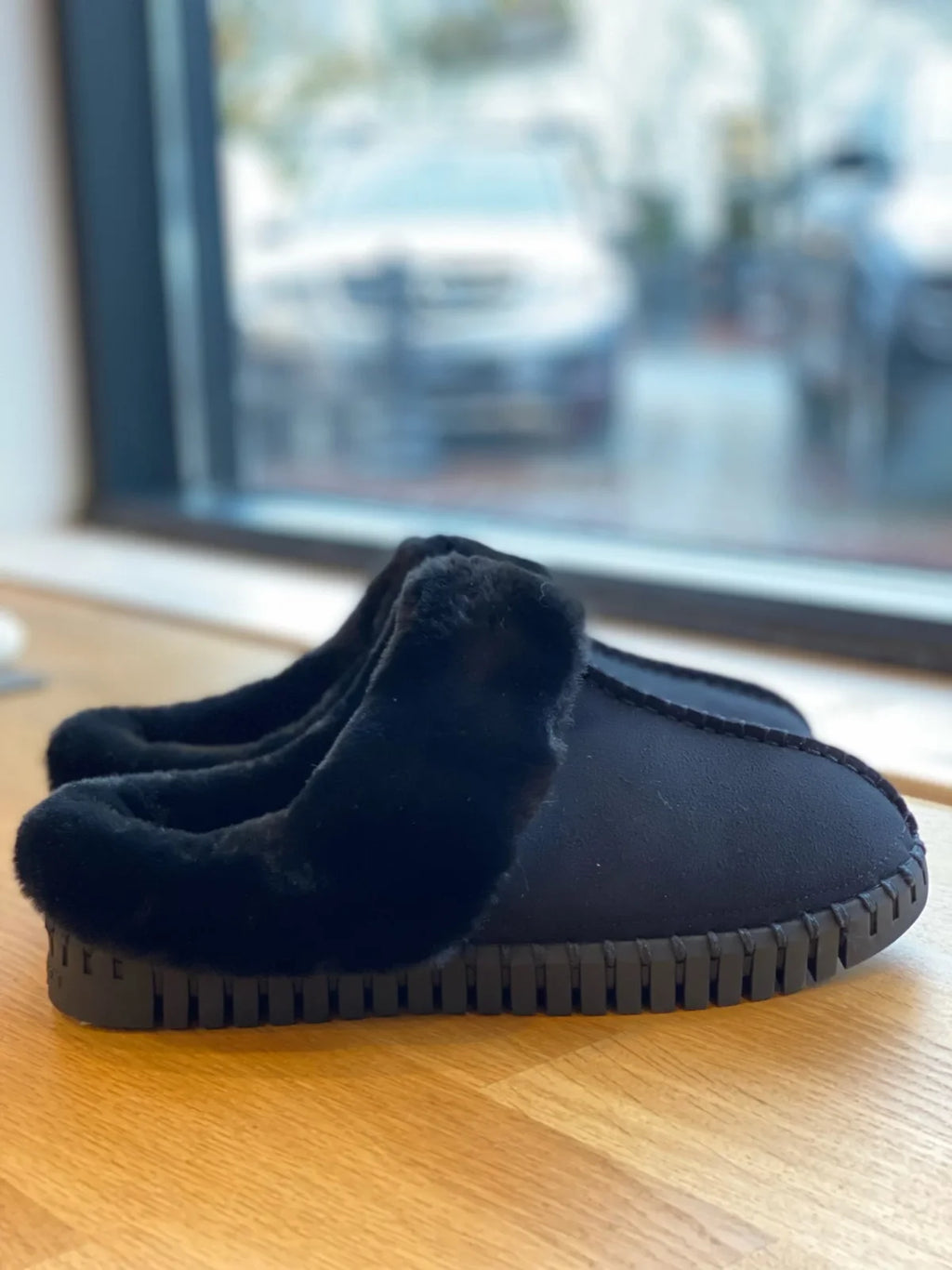 Stylish black on black tulip slippers by Ilse Jacobsen, perfect for cozy loungewear in coastal boutique clothing.