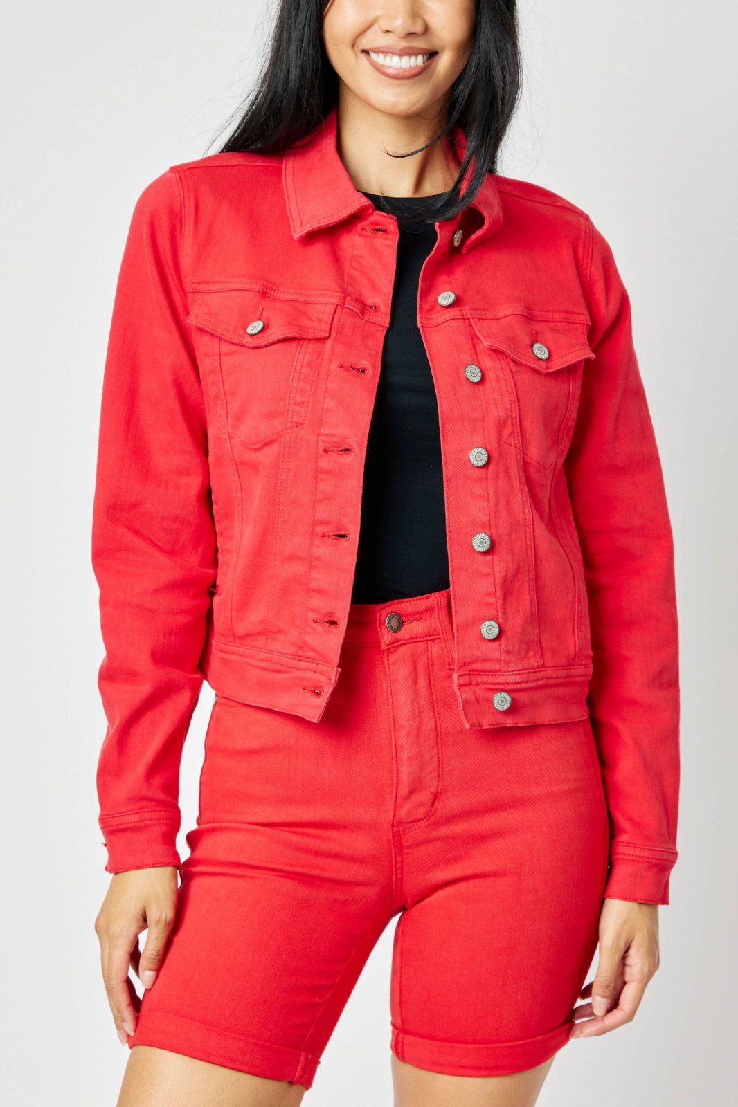 JUDY BLUE PLUS RED DENIM JACKET styled with black top, perfect for coastal fashion at Raggdoll Boutique.